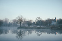 morning fog around a lake 