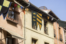 banners hanging between buildings 