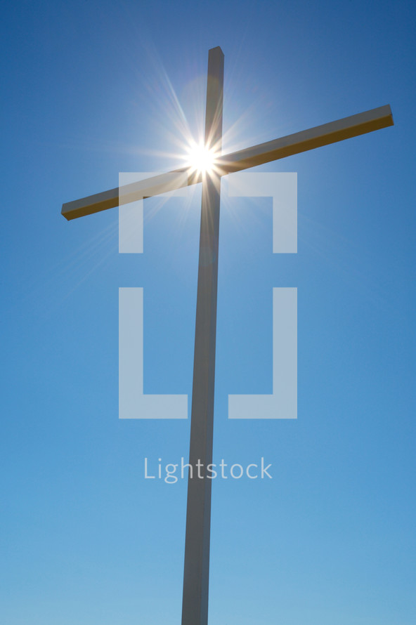 Wooden cross in the sky
