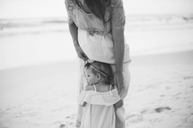 mother and daughter on a beach 