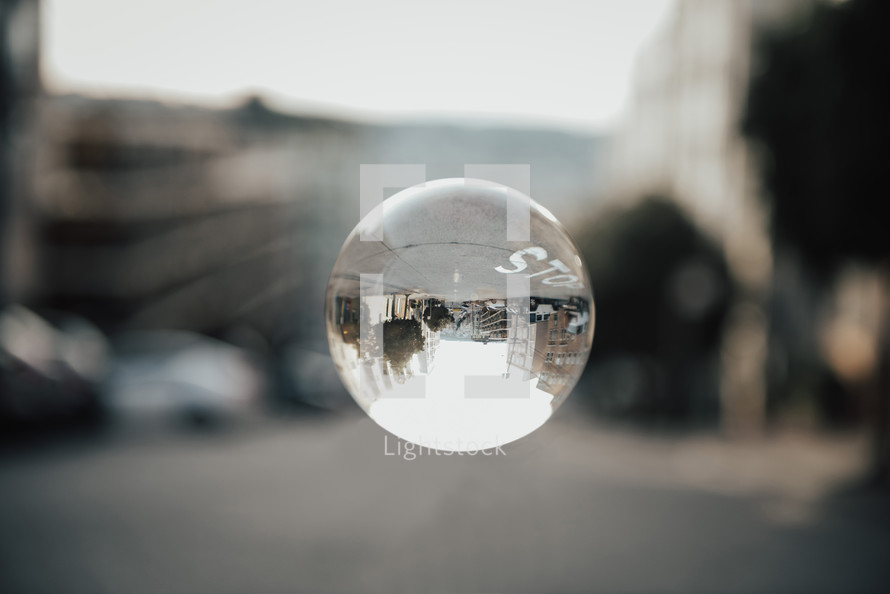 cityscape view through a glass orb 