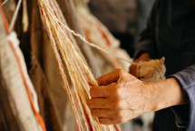 a woman weaving 