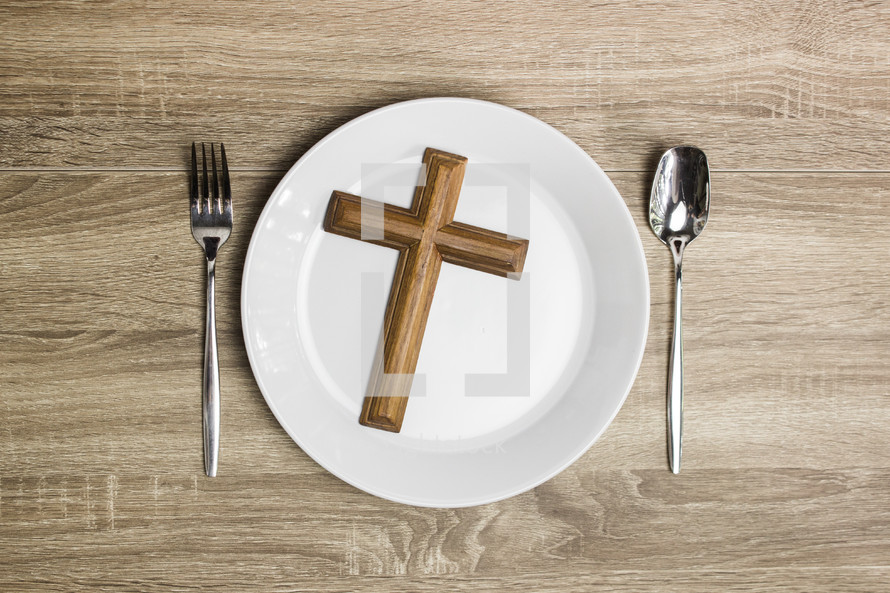 cross, plate, and silverware 
