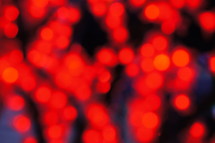 Bokeh. Christmas, abstract, blurred, out of focus lights, festive, red.