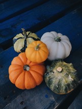fall pumpkins on a deck 