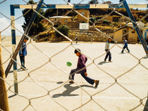 children playing kick ball 