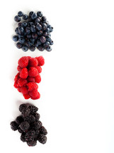 Assortment of forest fruits, rasperries, blueberries and blackberries.