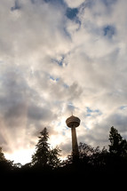 Silhouette of Skylon Tower at Niagara Falls at sunset.