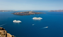 cruise ship near volcano on island of Santorini, Greece.