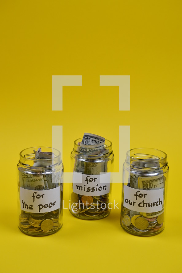 Savings jars full of money for mission, for the poor, and for our church 