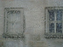 Raindrops on a window pane.