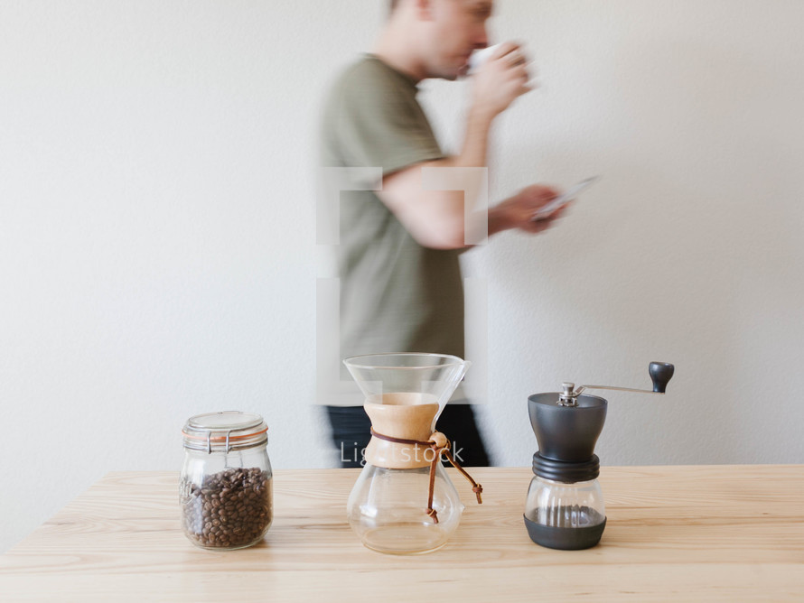 a man slow brewing coffee