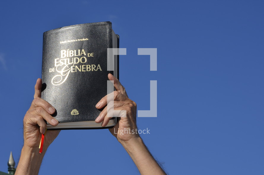 Elder holding a Bible 