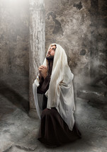 Jesus praying looking up to God 