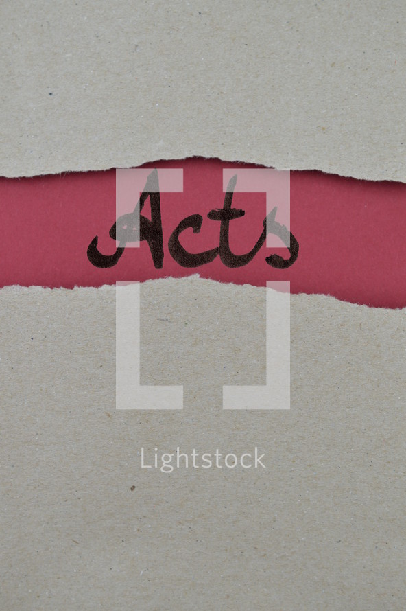 Acts - torn open kraft paper over dark red paper with the name of the book of Acts