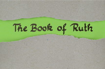The book of Ruth - torn open kraft paper over green paper with the name of the book Ruth 