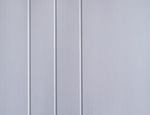 Vertical lines on a white surface
