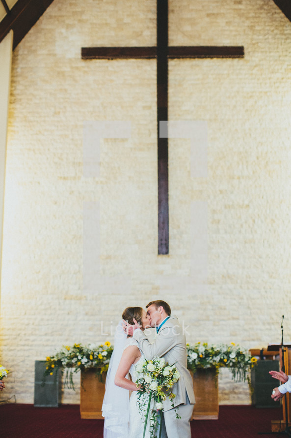 bride and groom kissing 