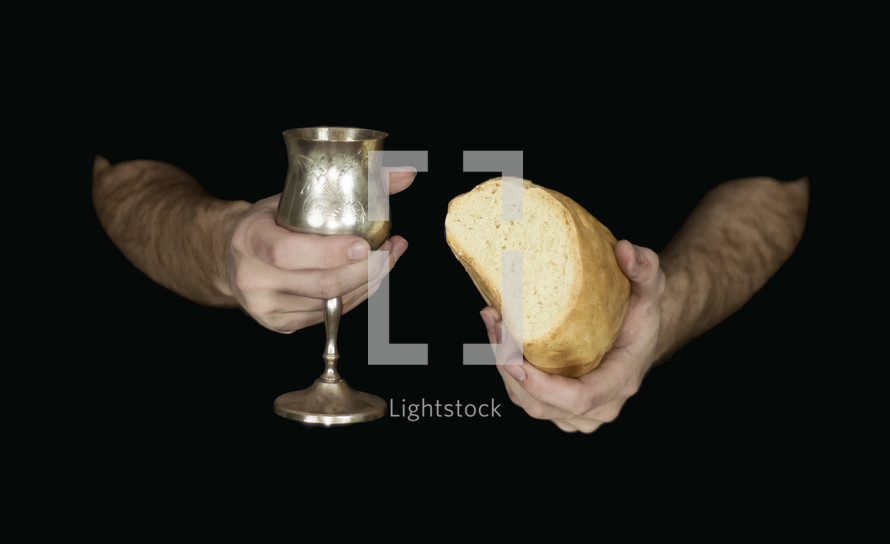 hands holding a chalice of wine and loaf bread 