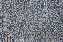Sidewalk made of pebbles, stones, rocks