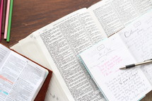 journal and highlighted pages of a Bible 