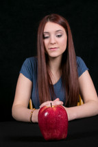 young woman and an apple 