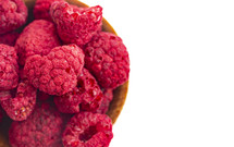 Freeze Dried Raspberries on a White Background