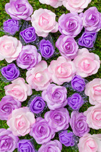 Bed of pink and purple Flowers flay layer background