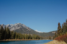 lake, mountains and evergreen forest 