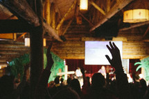 congregation with raised hands 
