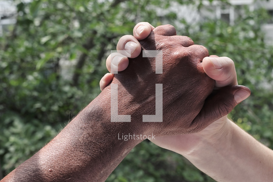 united holding hands in friendship 