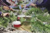 Decorating wreaths together as a group