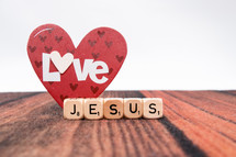 heart shape and word Jesus in scrabble pieces 