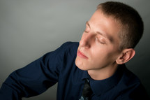 man with closed eyes 