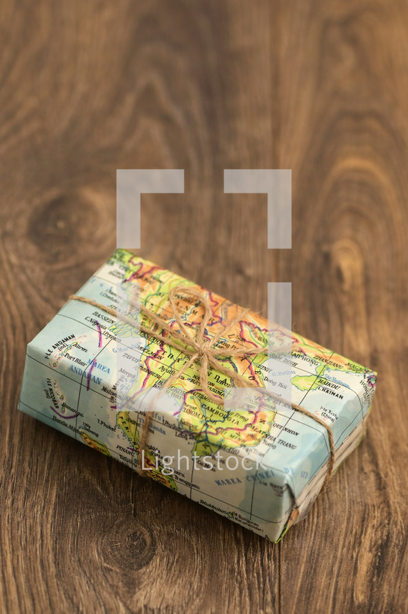 Map Paper Travel Concept with Gift Box With String Bow