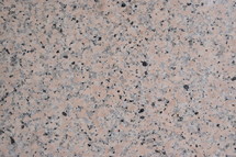 natural light pink granite stone surface as neutral background