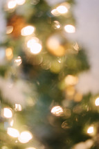 Blurred Christmas lights on a Christmas tree.