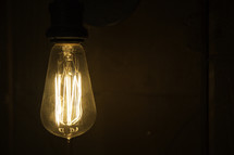 glowing filament in a lightbulb