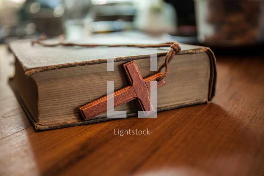 cross lanyard on a Bible 