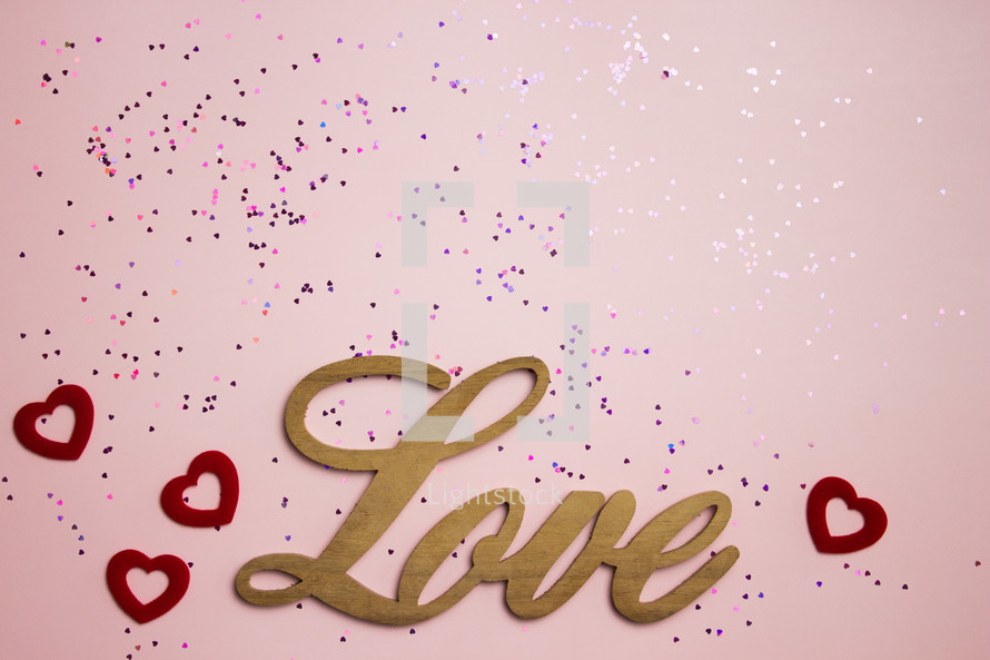 word Love on pink background 