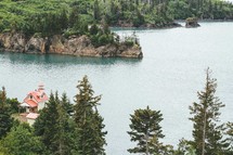 sea cliffs and lighthouse in Halibut Cove 