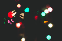 bokeh colored lights in darkness 