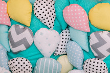 Colored pillows for baby bed