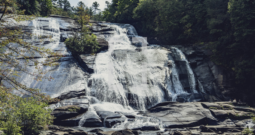 waterfall over rocks on a mountainside in Asheville, NC