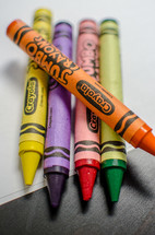 crayons on white paper 