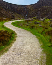 Path winding through a boulder strewn valley leading to Mahon Falls in Waterford County, Ireland