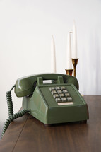 vintage telephone on a wood table 
