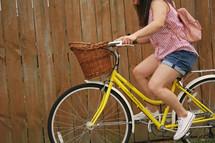 a girl riding a bike 
