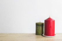 red and green candles on a white background 