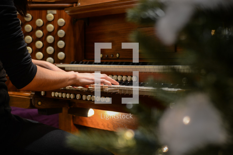 woman playing an organ 